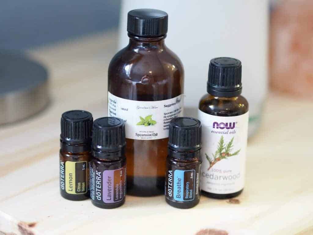 Five glass bottles of recommended oils for beginners 