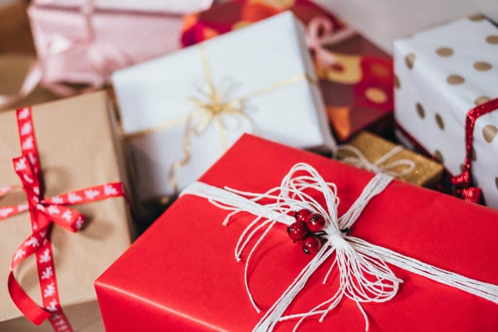 wrapped festive gifts in a pile