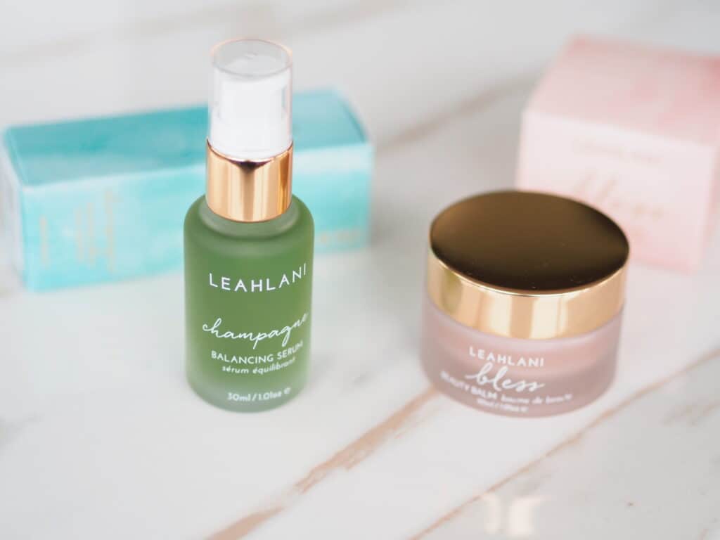 Leahlani Skincare Champagne serum and Happy Hour serum on counter for product review