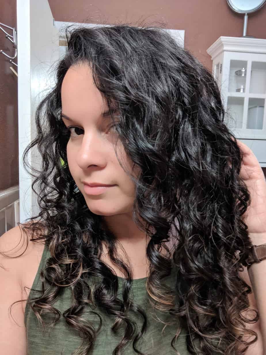 Keeping curly hair shop straight in humidity