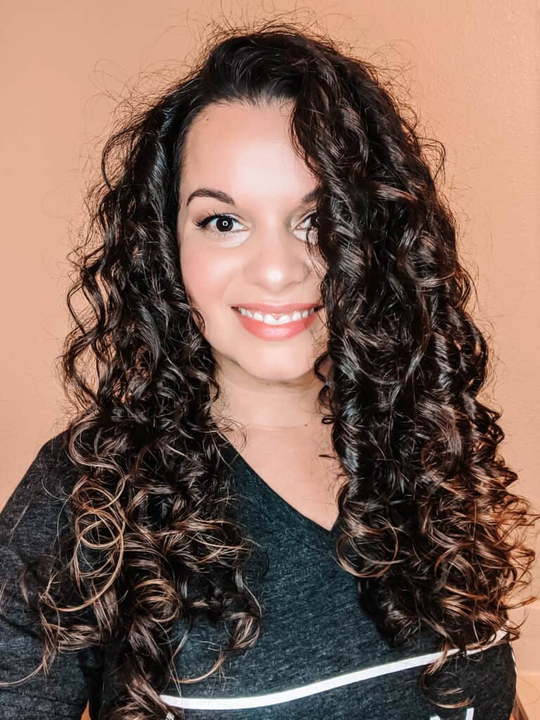 Delilah Orpi Holistic Enchilada smiling after reviewing Mop Top products for thin 2c 3a curly hair