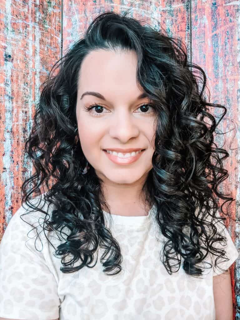 results of TreLuxe styling routine for fine curly hair with Delilah facing camera 