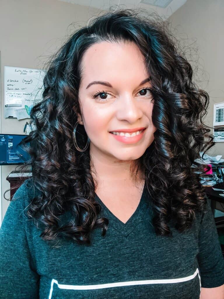 Delilah's very full bouncy curly hair