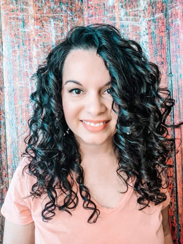 Delilah's full curls after using products for fine curly hair