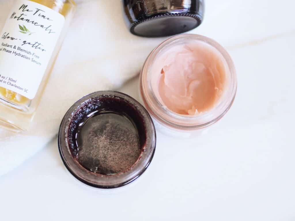 Open jars of Me Time brand Botanicals Clay Play Cleansing Grains & Purifying Mask for Review