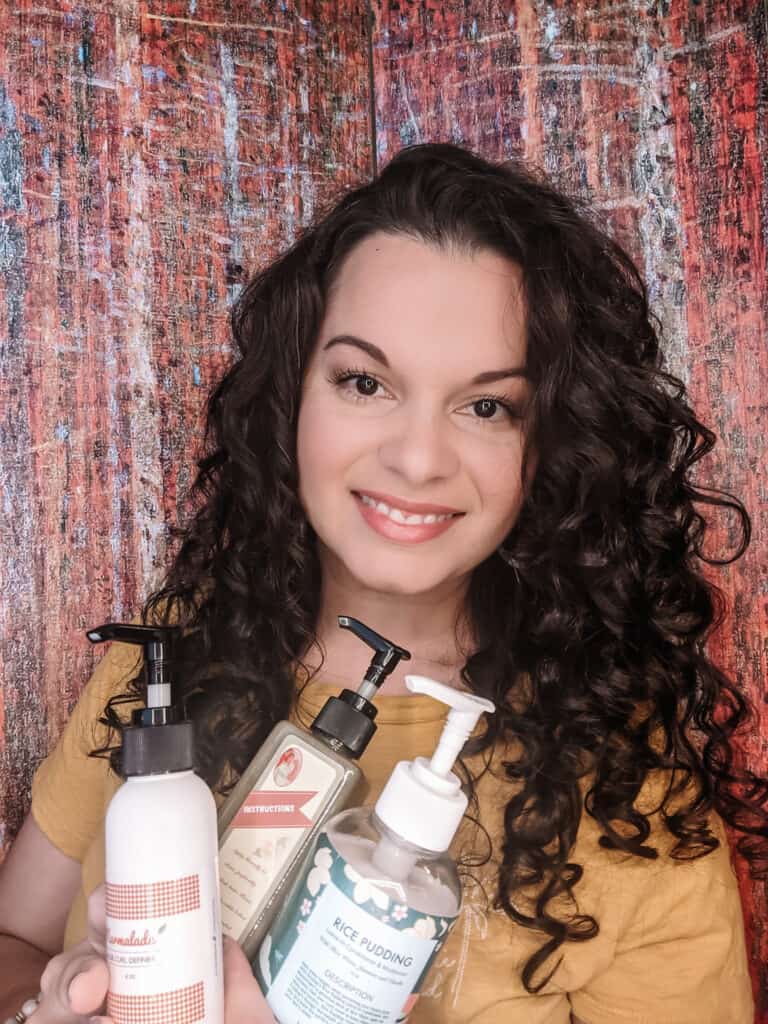 holding up ecoslay products for ecoslay review curly hair products