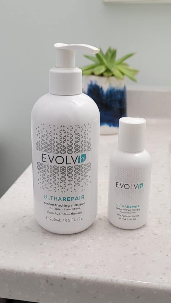 bottles of EVOLVh UltraRepair Reconstructin Masque 