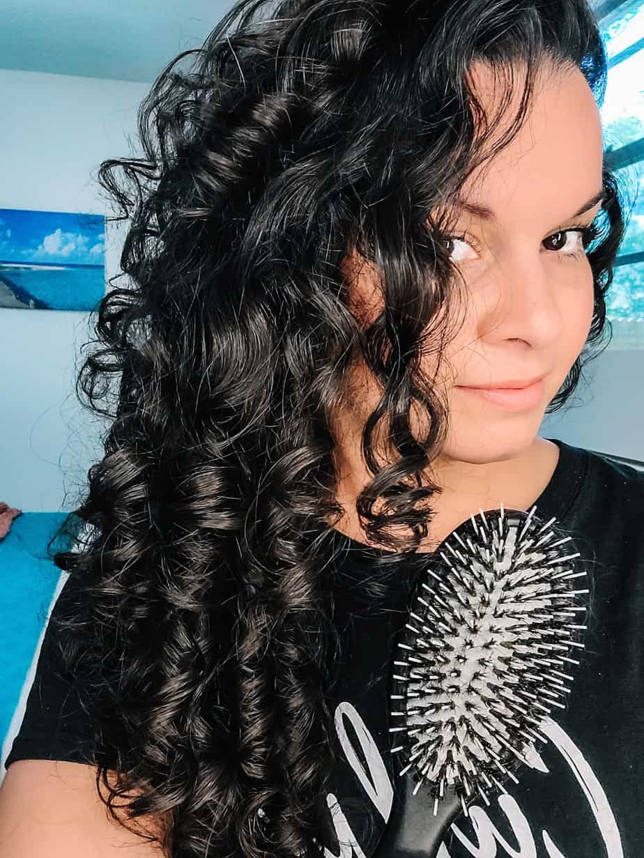 Brushing out curls to make outlet waves