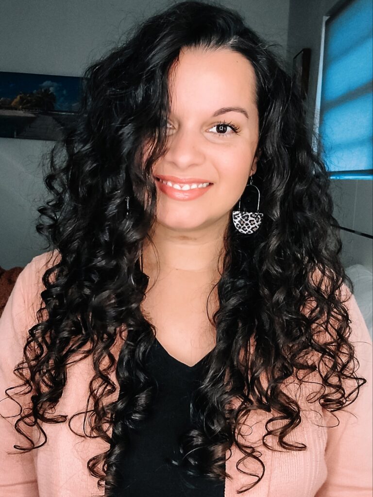 styled curly hair using products with polyquats