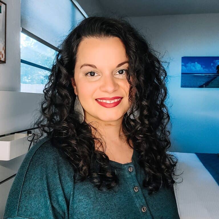 selfie showing curly hair after using curl refresher